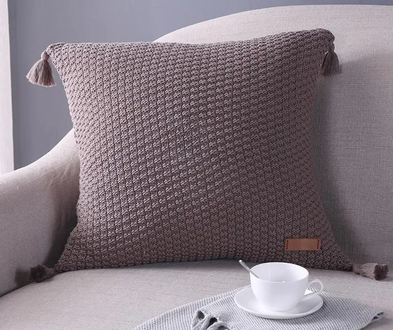 Knitted cushion patterns with buttons