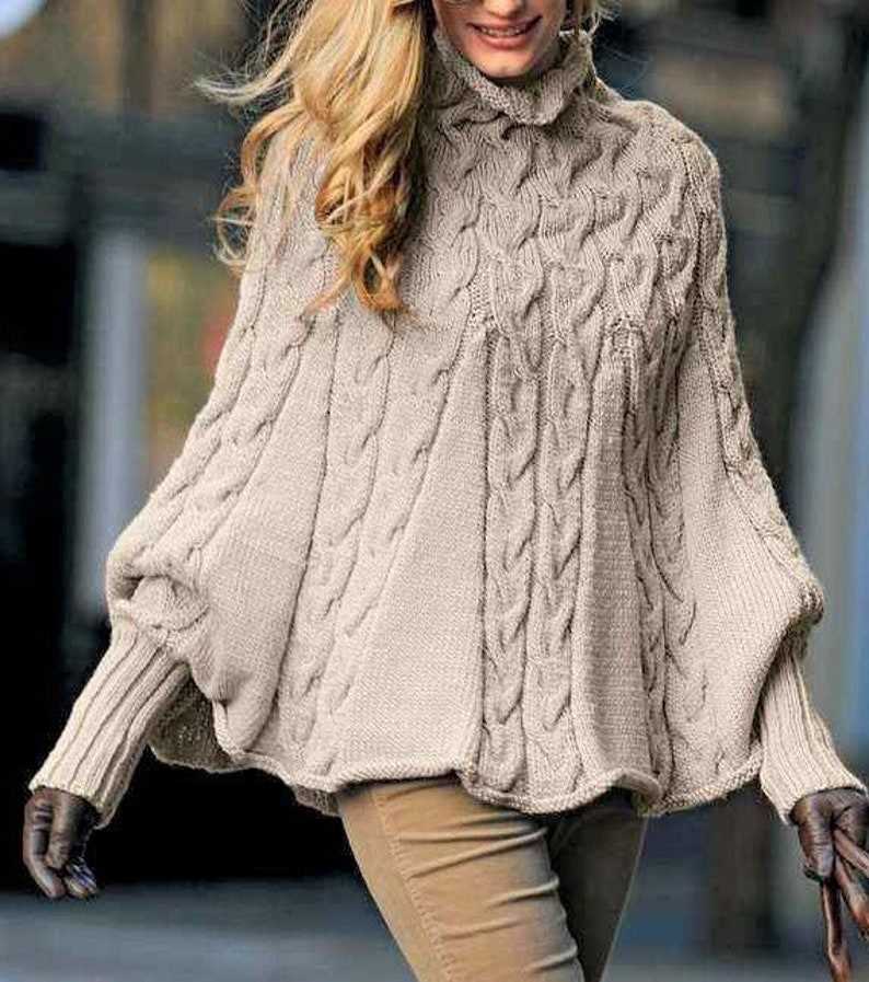 Knitting pattern for a poncho with sleeves