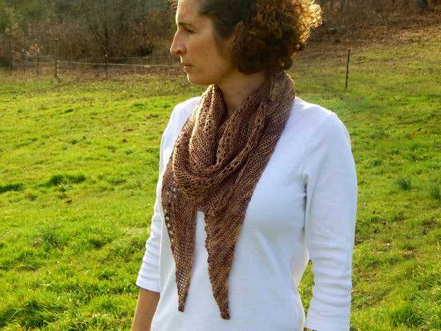 Asymmetrical knitted shawl pattern