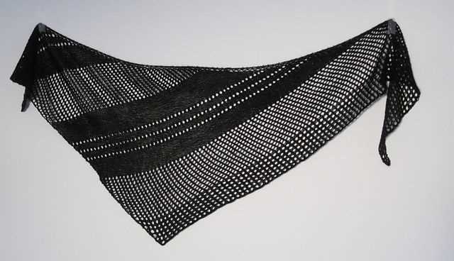 Asymmetrical knitted shawl pattern