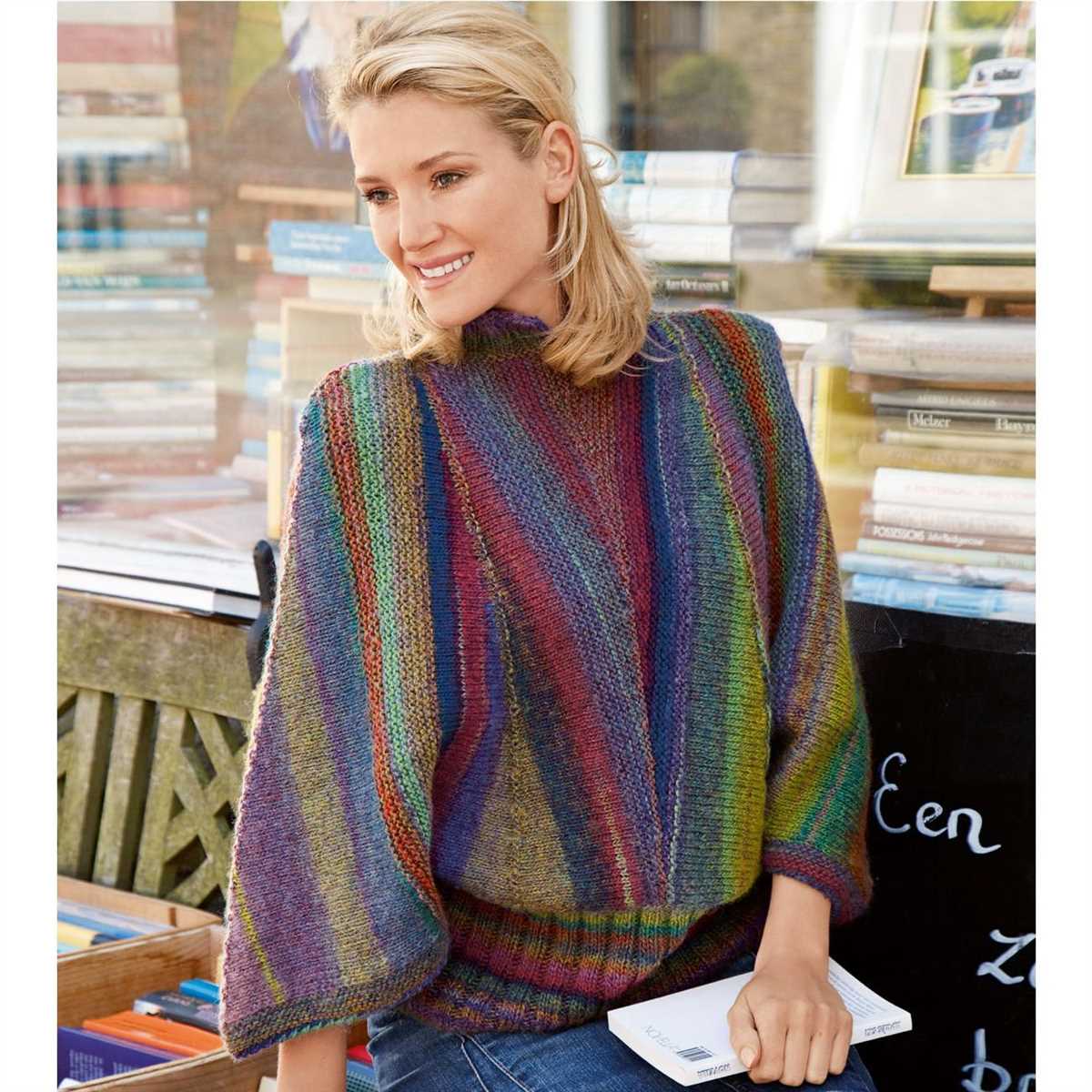 Knitting pattern for a poncho with sleeves