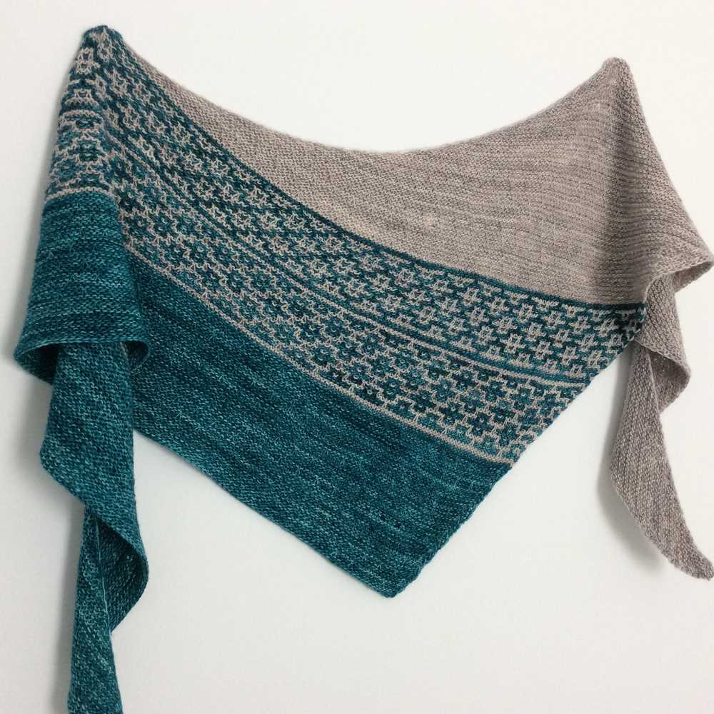 Asymmetrical knitted shawl pattern